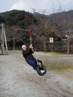 yoshi - paulie on the rope slide.JPG