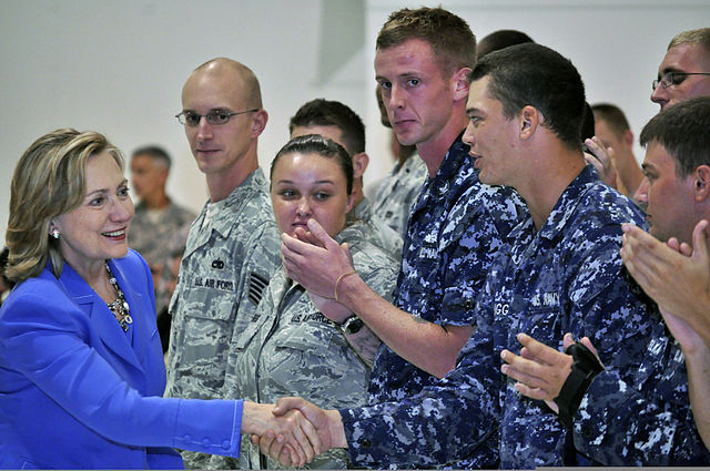 Clinton greeting troops