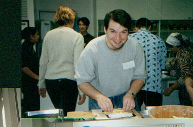 me cutting egg for breakfast.jpg, 1/3/2005, 29 kB